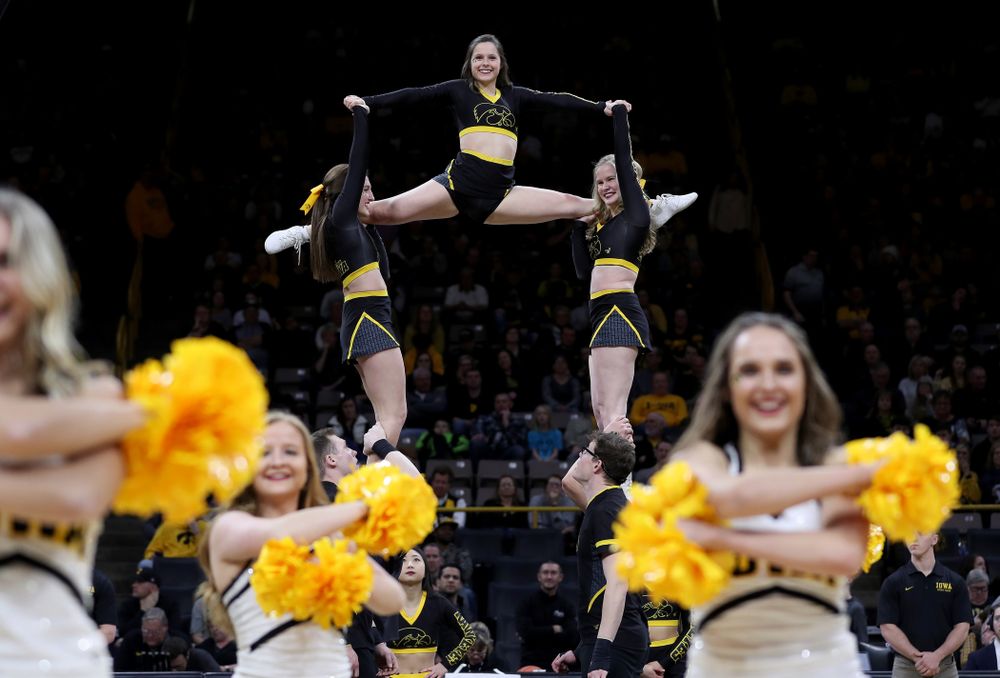The Iowa Cheerleaders and Dance Team perform on senior night at half-time of the Iowa Hawkeyes game against the Purdue Boilermakers Tuesday, March 3, 2020 at Carver-Hawkeye Arena. (Brian Ray/hawkeyesports.com)