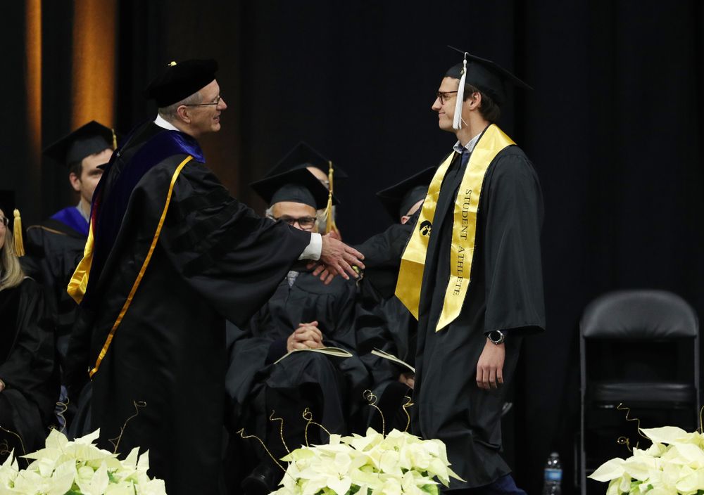 Iowa Swimming's Jerzy Twarowski during the Fall Commencement Ceremony Saturday, December 15, 2018 at Carver-Hawkeye Arena. (Brian Ray/hawkeyesports.com)