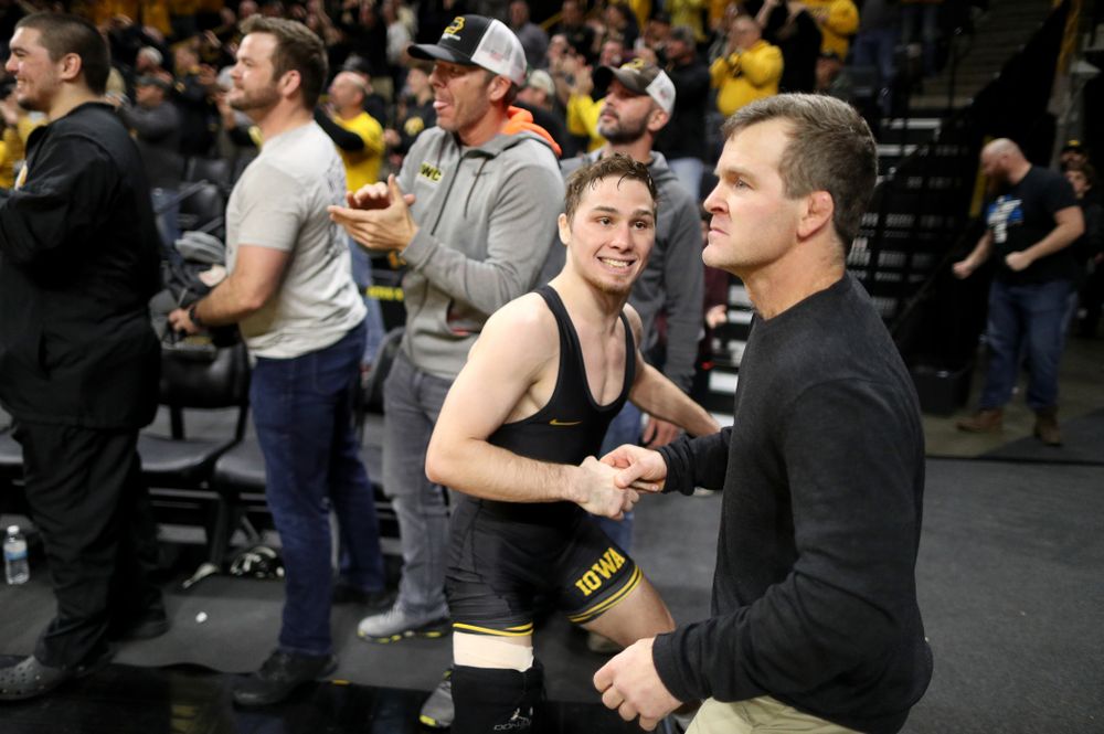 IowaÕs Spencer Lee cheers on teammate Austin DeSanto as he wrestles WisconsinÕs Seth Gross at 133 pounds Sunday, December 1, 2019 at Carver-Hawkeye Arena. DeSanto won the match 6-2. (Brian Ray/hawkeyesports.com)
