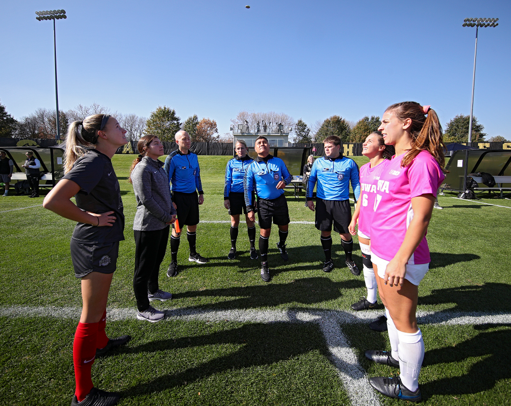 Iowa midfielder Isabella Blackman (6) and defender Hannah Drkulec (17) watch the coin toss before their match at the Iowa Soccer Complex in Iowa City on Sunday, Oct 27, 2019. (Stephen Mally/hawkeyesports.com)