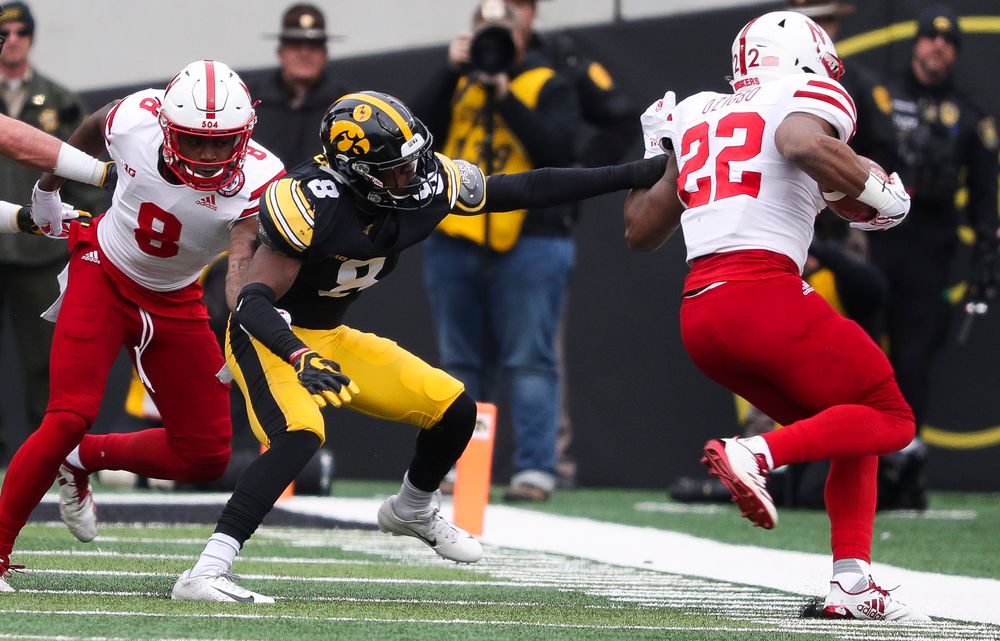 Iowa Hawkeyes defensive back Matt Hankins (8) pushes the ballcarrier out of bounds during a game against Nebraska at Kinnick Stadium on November 23, 2018. (Tork Mason/hawkeyesports.com)
