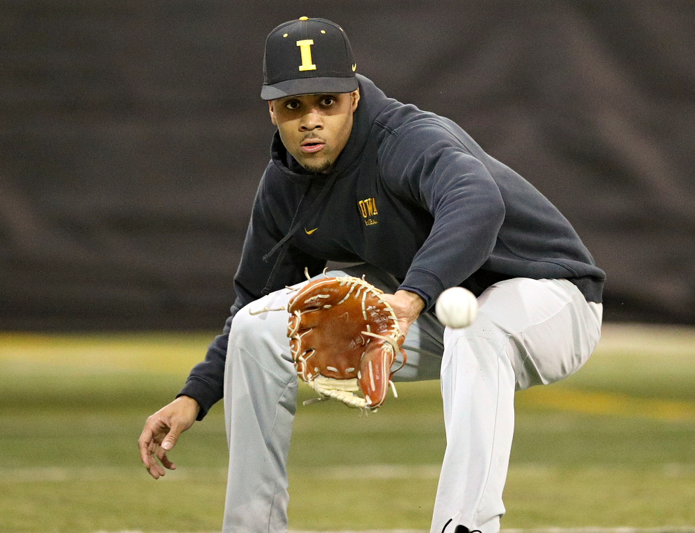 Iowa Hawkeyes infielder Lorenzo Elion (1) fields a ball during practice at the Hansen Football Performance Center in Iowa City on Friday, January 24, 2020. (Stephen Mally/hawkeyesports.com)