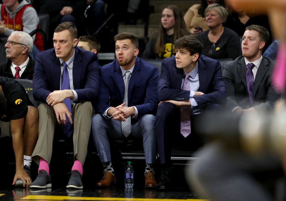 Iowa Hawkeyes forward Jack Nunge (2), guard Jordan Bohannon (3), and forward Patrick McCaffery (22) against the Maryland Terrapins Friday, January 10, 2020 at Carver-Hawkeye Arena. (Brian Ray/hawkeyesports.com)