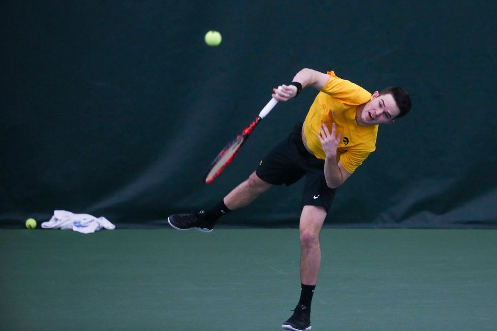 Iowa's Jonas Larsen at a tennis match vs Drake Friday, March 8, 2019 at the Hawkeye Tennis and Recreation Complex. (Lily Smith/hawkeyesports.com)