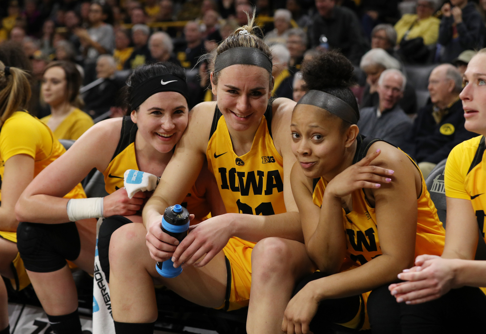 Iowa Hawkeyes forward Megan Gustafson (10), forward Hannah Stewart (21), and guard Tania Davis (11) against the Northwestern Wildcats Sunday, March 3, 2019 at Carver-Hawkeye Arena. (Brian Ray/hawkeyesports.com)