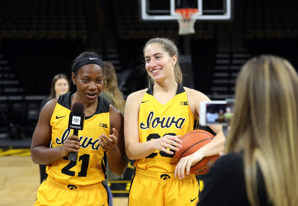 Iowa Hawkeyes guard Zion Sanders (21) and guard Kate Martin (20) during the teamÕs annual media day Thursday, October 24, 2019 at Carver-Hawkeye Arena. (Brian Ray/hawkeyesports.com)