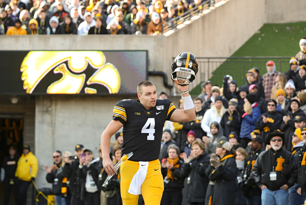 Iowa Hawkeyes quarterback Nate Stanley (4) is acknowledged on senior day before their game at Kinnick Stadium in Iowa City on Saturday, Nov 23, 2019. (Stephen Mally/hawkeyesports.com)