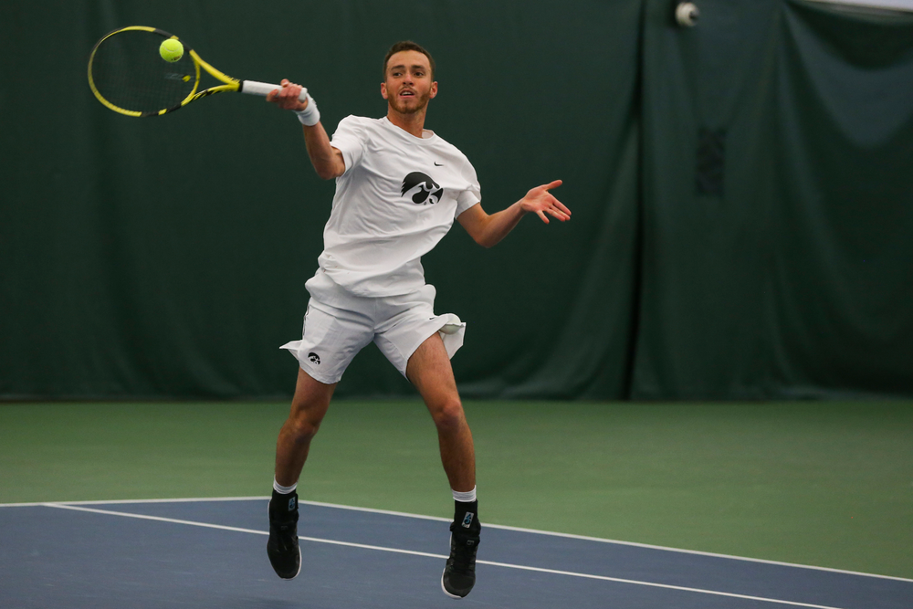 Iowa’s Kareem Allaf hits a forehand during the Iowa men’s tennis match vs Western Michigan on Saturday, January 18, 2020 at the Hawkeye Tennis and Recreation Complex. (Lily Smith/hawkeyesports.com)
