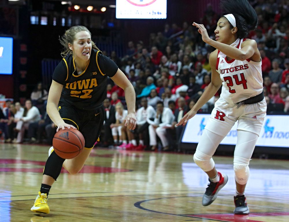 Iowa guard Kathleen Doyle (22) drives with the ball during the third quarter of their game at the Rutgers Athletic Center in Piscataway, N.J. on Sunday, March 1, 2020. (Stephen Mally/hawkeyesports.com)