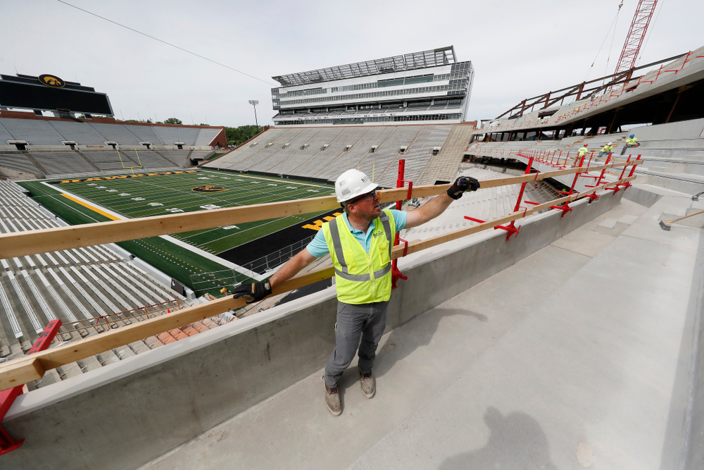 University of Iowa Senior Construction Project Manager Michael Kearns talks about the outdoor seating on the club level of the north end zone Wednesday, June 6, 2018 at Kinnick Stadium. (Brian Ray/hawkeyesports.com)