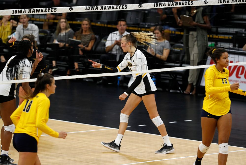 Iowa Hawkeyes outside hitter Cali Hoye (14) against the Michigan Wolverines Sunday, September 23, 2018 at Carver-Hawkeye Arena. (Brian Ray/hawkeyesports.com)