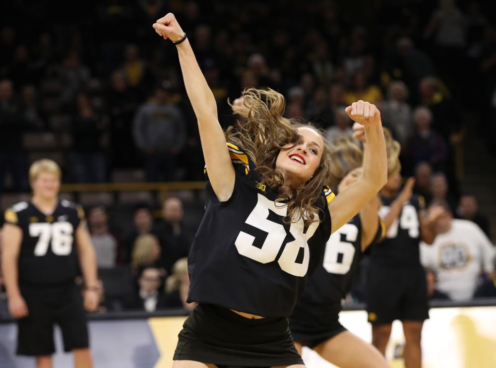 The Iowa Dance Team performs with the Iowa Football Team at halftime of the Iowa Hawkeyes game against the Indiana Hoosiers Friday, February 22, 2019 at Carver-Hawkeye Arena. (Brian Ray/hawkeyesports.com)