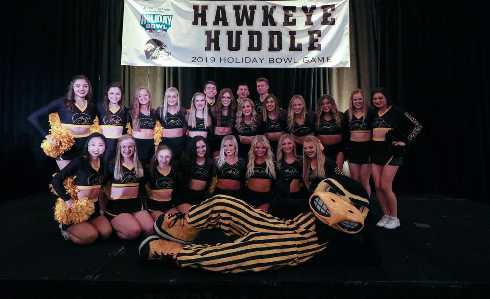 The Hawkeye Marching Band and the Iowa Spirit Squads perform during the Holiday Bowl Hawkeye Huddle Thursday, December 26, 2019 at the Hilton in downtown San Diego. (Brian Ray/hawkeyesports.com)