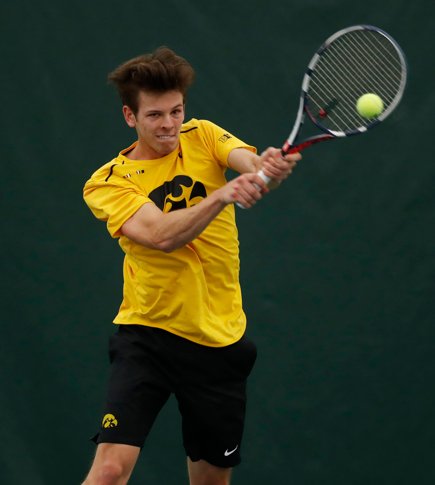 Piotr Smietana against the Illinois Fighting Illini Saturday, March 31, 2018 at Hawkeye Tennis and Recreation Center. (Brian Ray/hawkeyesports.com)