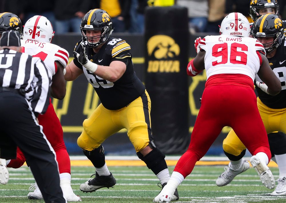 Iowa Hawkeyes offensive lineman Keegan Render (69) pass blocks during a game against Nebraska at Kinnick Stadium on November 23, 2018. (Tork Mason/hawkeyesports.com)