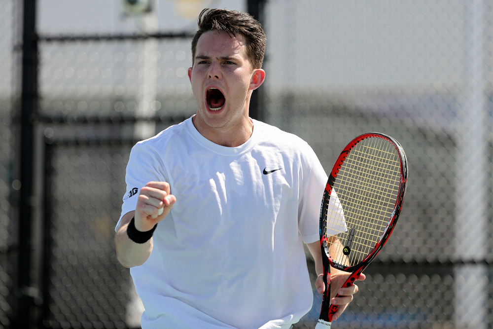 Iowa's Jonas Larson celebrates a point during his match against Michigan at the Hawkeye Tennis and Recreation Complex in Iowa City on Sunday, Apr. 21, 2019. (Stephen Mally/hawkeyesports.com)