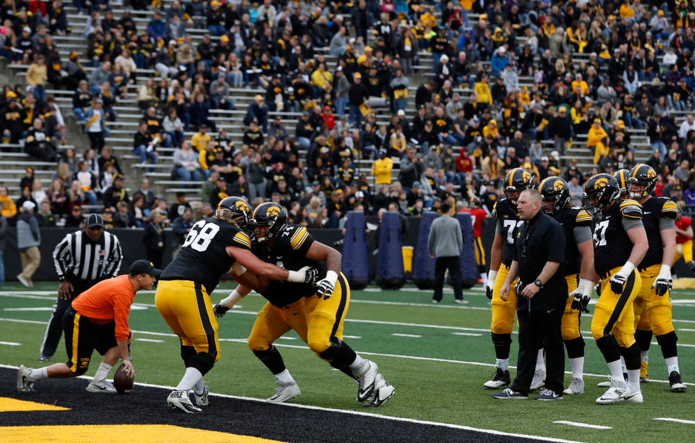 Iowa Hawkeyes offensive lineman Tristan Wirfs (74) and offensive lineman Landan Paulsen (68) during the final spring practice Friday, April 20, 2018 at Kinnick Stadium. (Brian Ray/hawkeyesports.com)