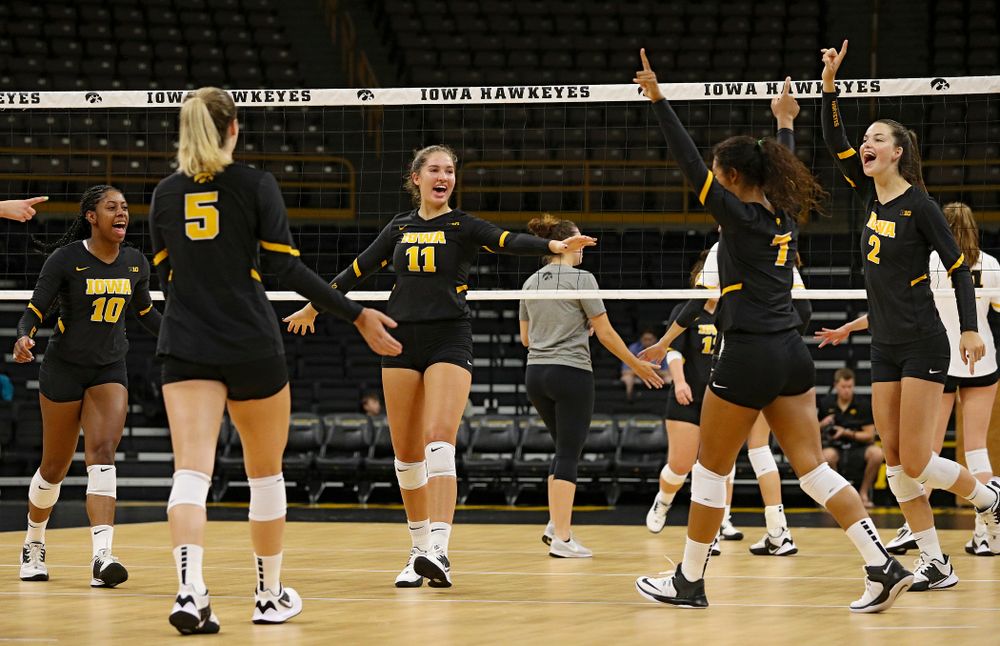 Iowa’s Blythe Rients (11) celebrates with her teammates after a score during the first set of the Black and Gold scrimmage at Carver-Hawkeye Arena in Iowa City on Saturday, Aug 24, 2019. (Stephen Mally/hawkeyesports.com)