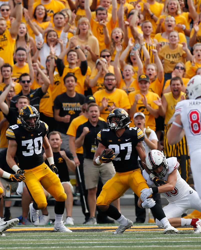 Iowa Hawkeyes defensive back Amani Hooker (27) interceptss a pass against the Northern Illinois Huskies Saturday, September 1, 2018 at Kinnick Stadium. (Brian Ray/hawkeyesports.com)