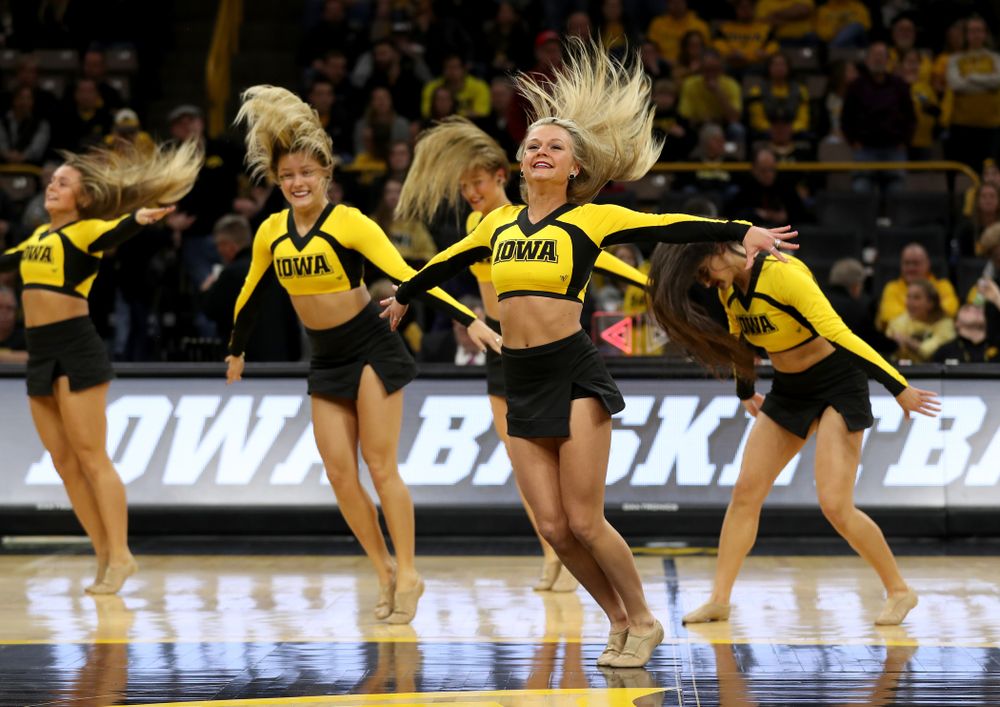 The Iowa Spirit Squad performs with participants in Spirit Squad Day at halftime of the Iowa Hawkeyes game against the Nebraska Cornhuskers Saturday, February 8, 2020 at Carver-Hawkeye Arena. (Brian Ray/hawkeyesports.com)