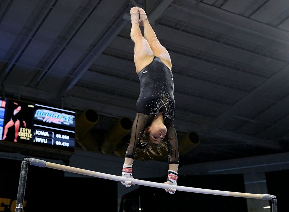 Iowa’s Erin Castle competes on the bars during their meet at Carver-Hawkeye Arena in Iowa City on Sunday, March 8, 2020. (Stephen Mally/hawkeyesports.com)