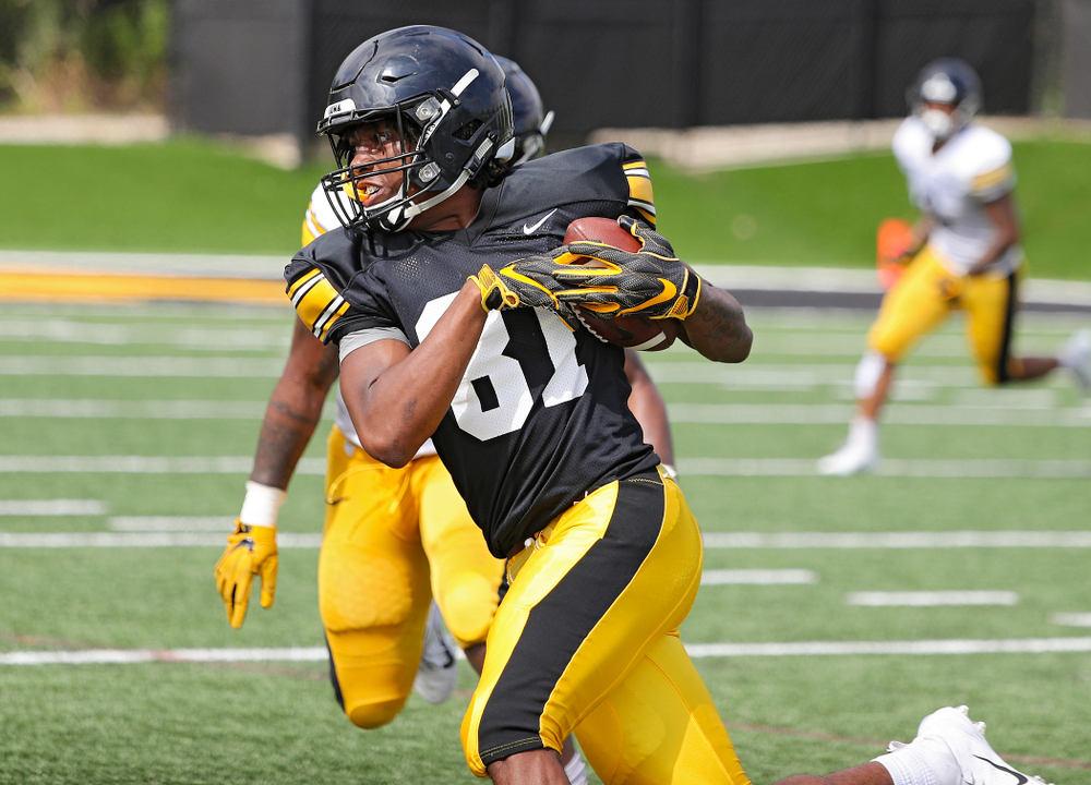 Iowa Hawkeyes wide receiver Desmond Hutson (81) runs after pulling in a pass during Fall Camp Practice No. 11 at the Hansen Football Performance Center in Iowa City on Wednesday, Aug 14, 2019. (Stephen Mally/hawkeyesports.com)