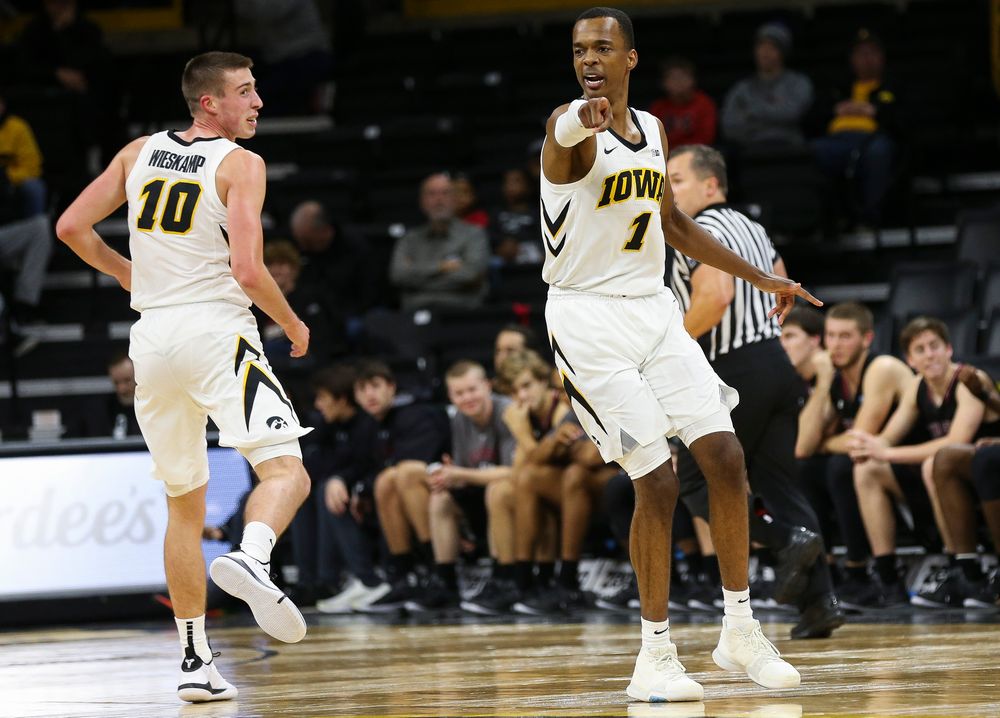 Iowa Hawkeyes guard Maishe Dailey (1) directs the defense in transition during a game against Guilford College at Carver-Hawkeye Arena on November 4, 2018. (Tork Mason/hawkeyesports.com)