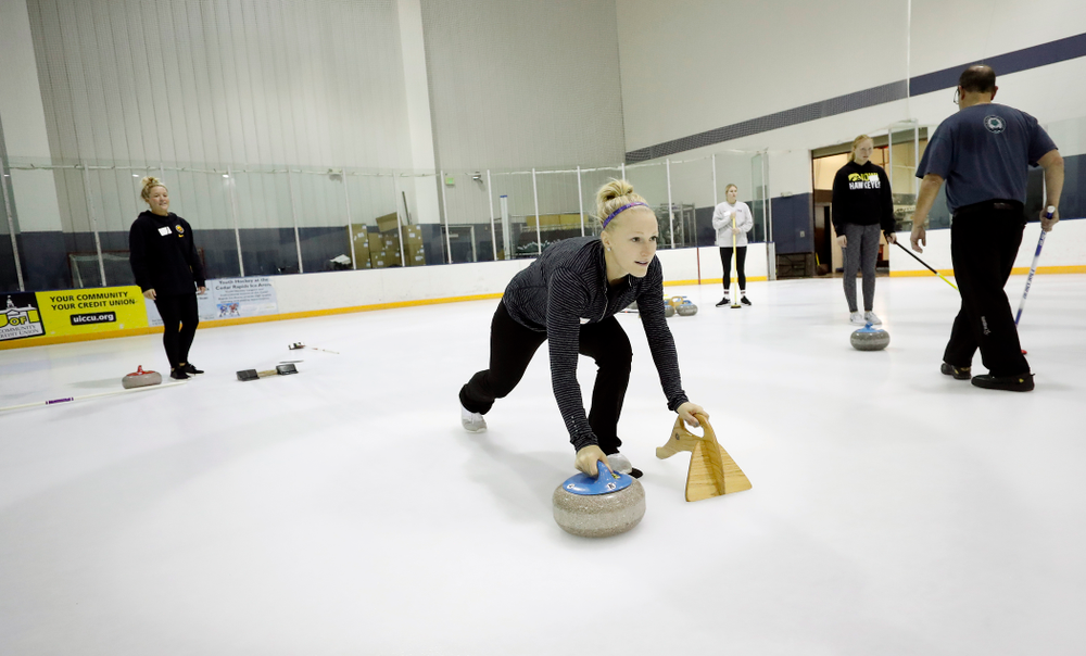 Members of the Iowa Softball team learn the sport of curling as part of a team building event Wednesday, January 10, 2018 at the Cedar Rapids Ice Arena. (Brian Ray/hawkeyesports.com)