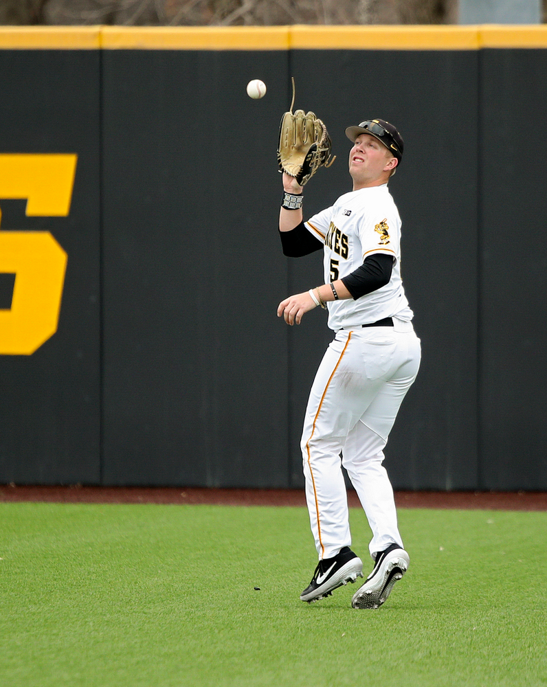 Iowa right fielder Zeb Adreon (5) runs down a fly ball for an out during the third inning of their college baseball game at Duane Banks Field in Iowa City on Wednesday, March 11, 2020. (Stephen Mally/hawkeyesports.com)