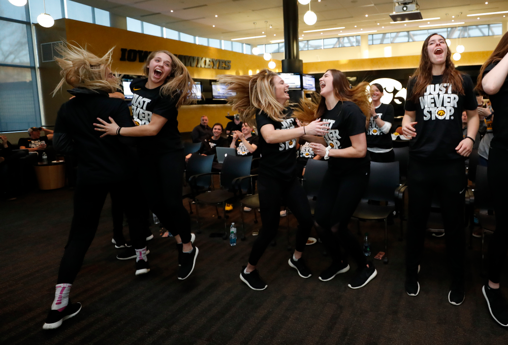 The Iowa Hawkeyes celebrate after finding out their seed in the 2018 NCAA Women's Basketball Tournament