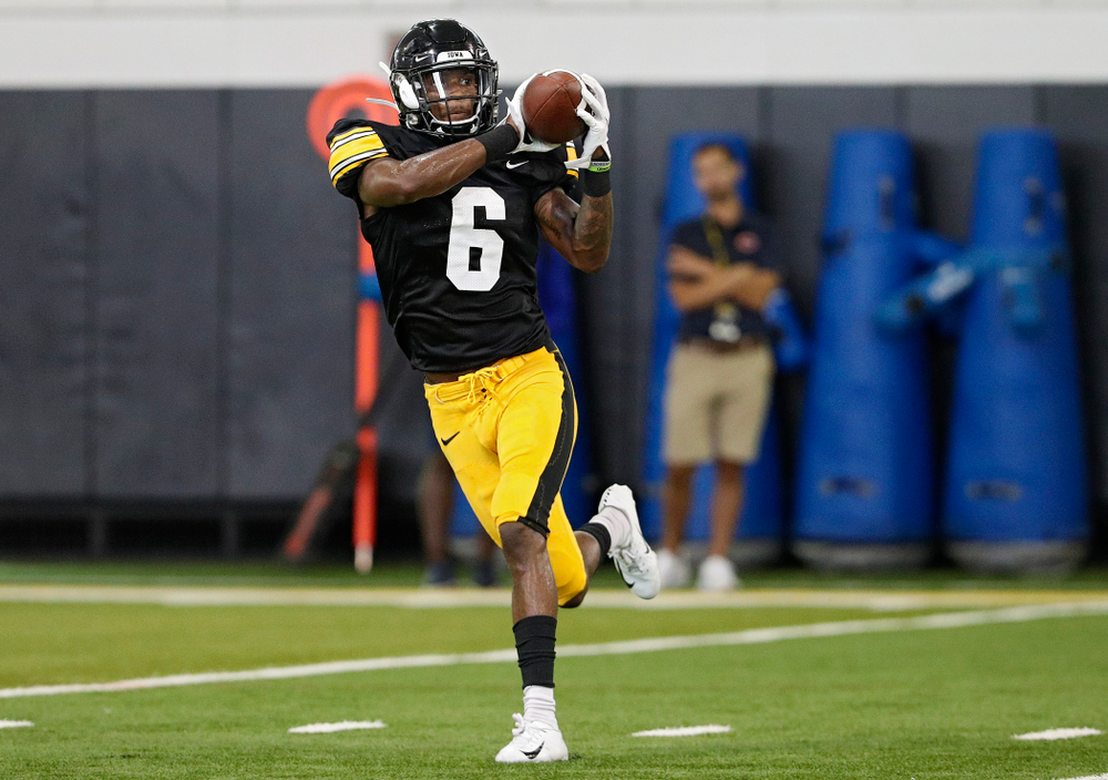 Iowa Hawkeyes wide receiver Ihmir Smith-Marsette (6) pulls in a pass during Fall Camp Practice No. 6 at the Hansen Football Performance Center in Iowa City on Thursday, Aug 8, 2019. (Stephen Mally/hawkeyesports.com)
