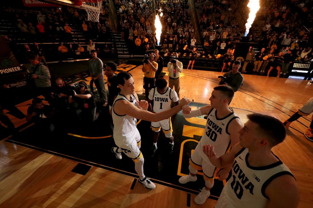 Iowa Hawkeyes forward Ryan Kriener (15) and guard Connor McCaffery (30) against the Maryland Terrapins Friday, January 10, 2020 at Carver-Hawkeye Arena. (Brian Ray/hawkeyesports.com)