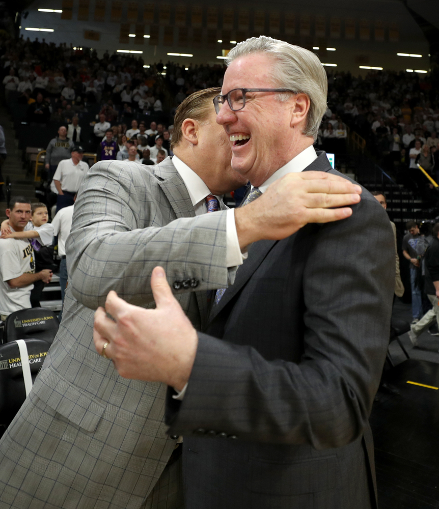 Iowa Hawkeyes head coach Fran McCaffery talks with Illinois Fighting Illini head coach Brad Underwood Sunday, February 2, 2020 at Carver-Hawkeye Arena. (Brian Ray/hawkeyesports.com)