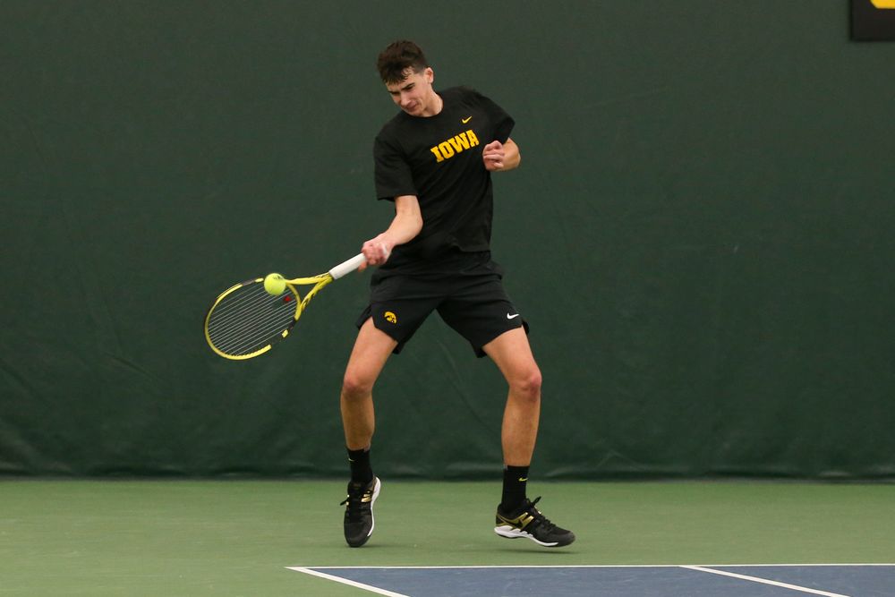 Iowa’s Matt Clegg returns a ball during the Iowa men’s tennis meet vs VCU on Saturday, February 29, 2020 at the Hawkeye Tennis and Recreation Complex. (Lily Smith/hawkeyesports.com)