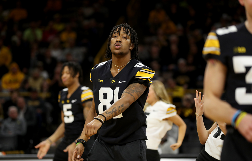Members of the Hawkeye Football team performs with the Iowa Dance Team at halftime of the Iowa Hawkeyes game against the Ohio State Buckeyes Thursday, February 20, 2020 at Carver-Hawkeye Arena. (Brian Ray/hawkeyesports.com)