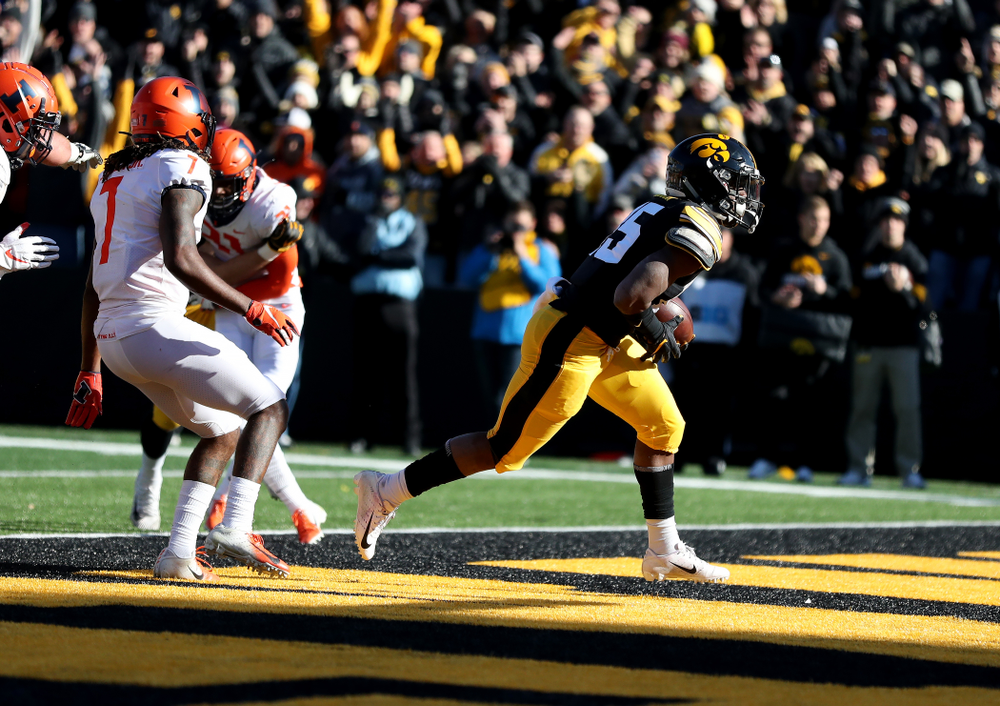 Iowa Hawkeyes running back Tyler Goodson (15) scores a touchdown against the Illinois Fighting Illini Saturday, November 23, 2019 at Kinnick Stadium. (Brian Ray/hawkeyesports.com)