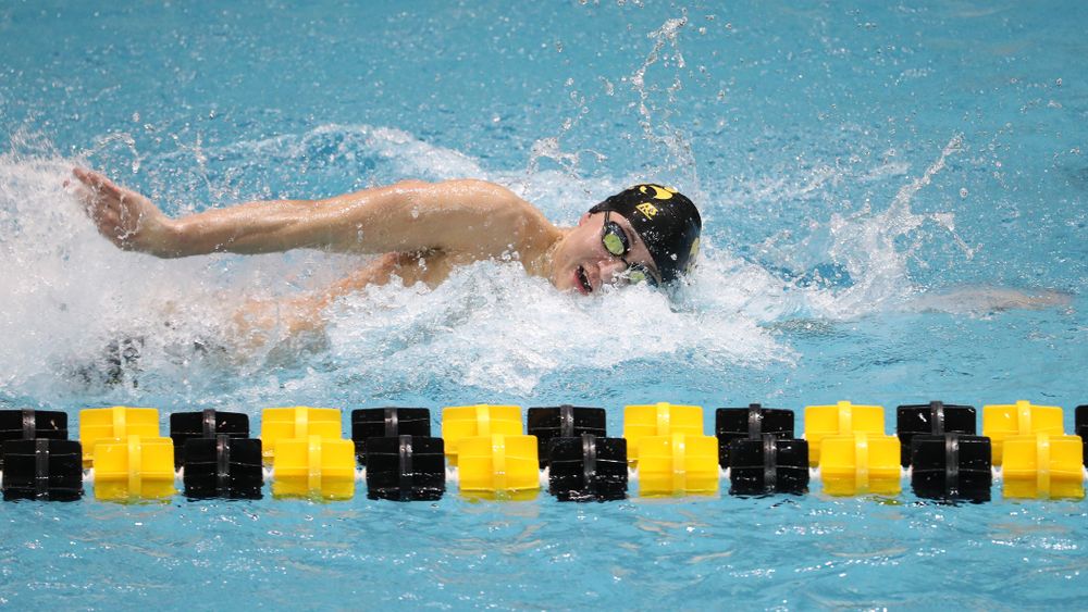 Iowa's Michael Tenney swims the third leg of the 800 freestyle relay at the 2019 Big Ten Swimming and Diving meet Wednesday, February 27, 2019 at the Campus Wellness and Recreation Center. (Brian Ray/hawkeyesports.com)