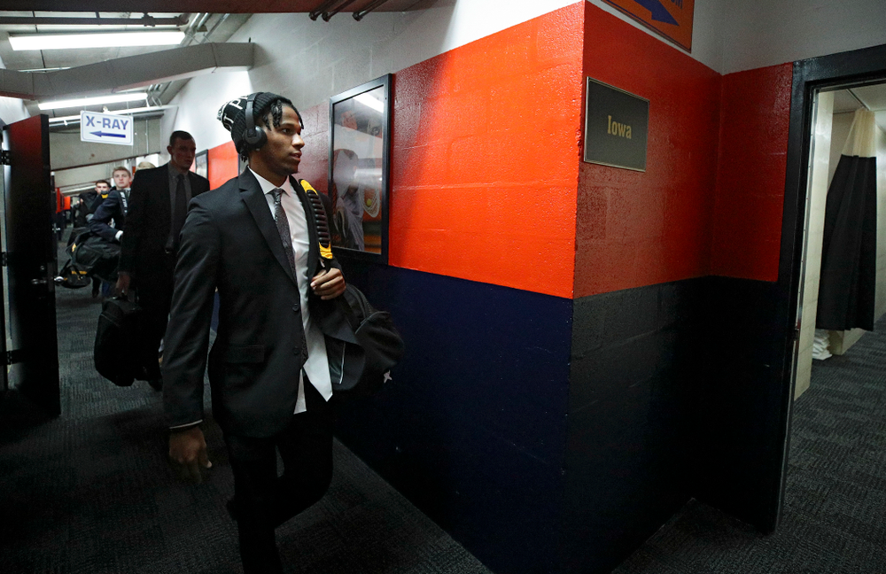Iowa Hawkeyes guard Bakari Evelyn (4) walks to the locker room as the team arrives before their ACC/Big Ten Challenge game at the Carrier Dome in Syracuse, N.Y. on Tuesday, Dec 3, 2019. (Stephen Mally/hawkeyesports.com)