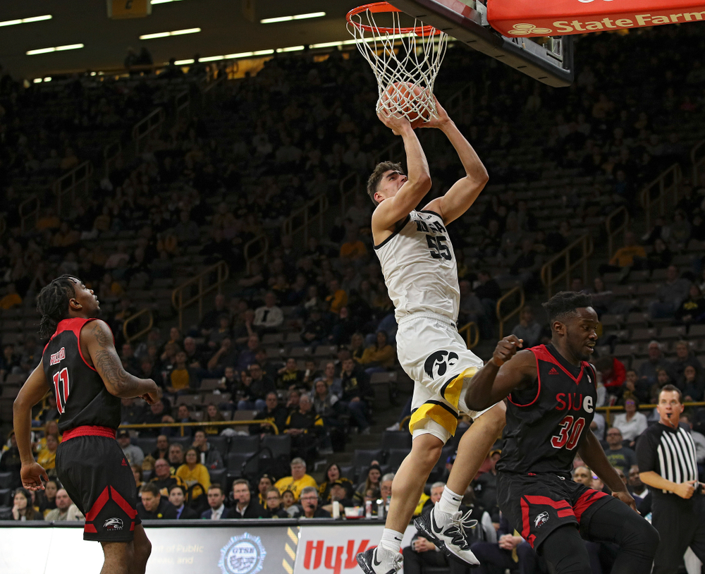 Iowa Hawkeyes center Luka Garza (55) scores a basket during the second half of their game at Carver-Hawkeye Arena in Iowa City on Friday, Nov 8, 2019. (Stephen Mally/hawkeyesports.com)