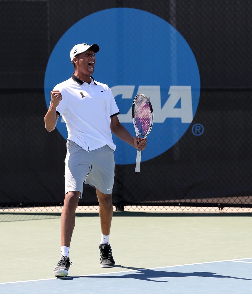 IowaÕs Oliver Okonkwo and Will Davies play a doubles match against the Michigan Wolverines Sunday, April 21, 2019 at the Hawkeye Tennis and Recreation Complex. (Brian Ray/hawkeyesports.com)