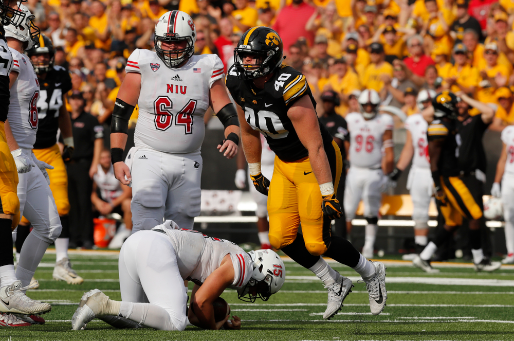 Iowa Hawkeyes defensive end Parker Hesse (40) sacks Northern Illinois Huskies quarterback Marcus Childers (15) Saturday, September 1, 2018 at Kinnick Stadium. (Brian Ray/hawkeyesports.com)