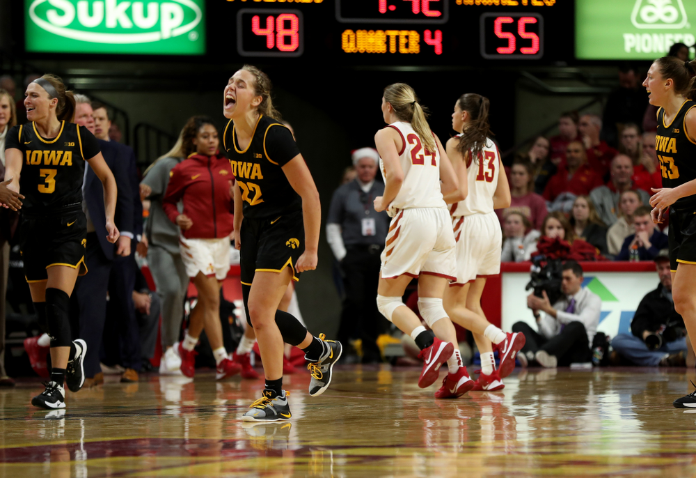 Iowa Hawkeyes guard Kathleen Doyle (22) celebrates against the Iowa State Cyclones Wednesday, December 11, 2019 at Hilton Coliseum in Ames, Iowa(Brian Ray/hawkeyesports.com)