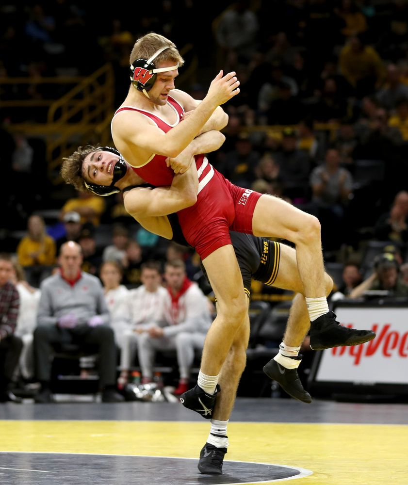 IowaÕs Austin DeSanto wrestles WisconsinÕs Seth Gross at 133 pounds Sunday, December 1, 2019 at Carver-Hawkeye Arena. DeSanto won the match 6-2. (Brian Ray/hawkeyesports.com)