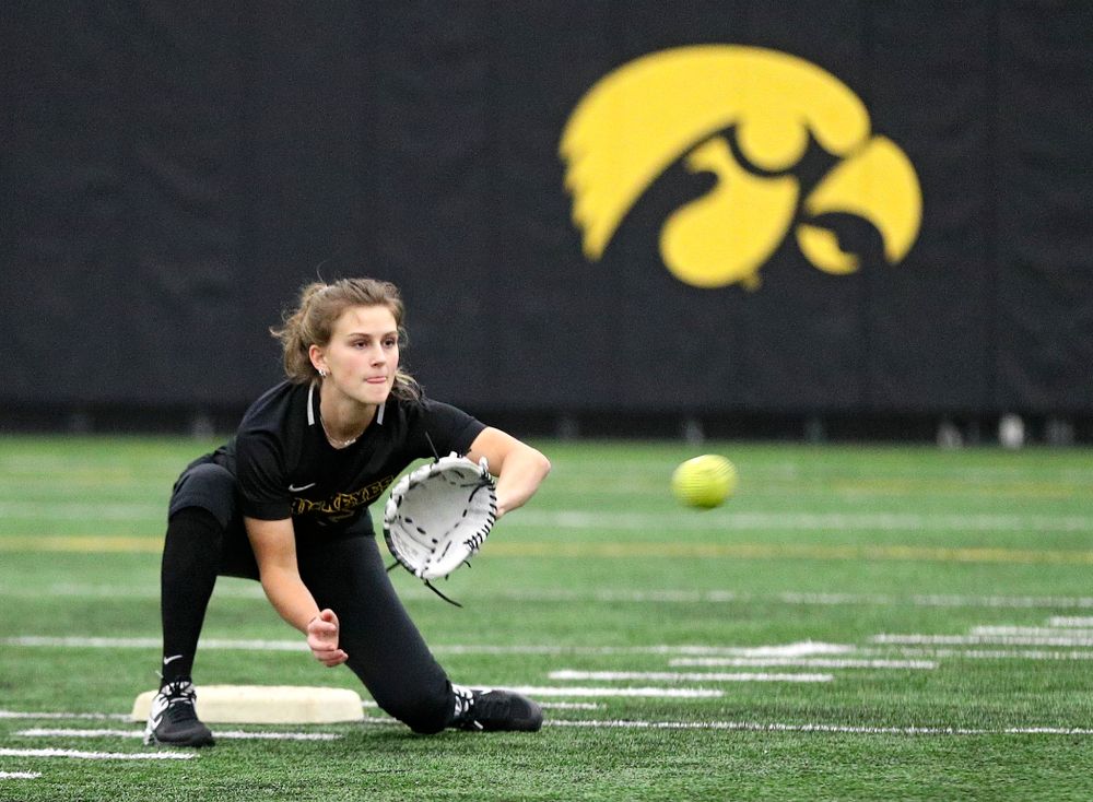 Iowa infielder Mia Ruther (26) pulls in a throw as they run a drill during Iowa Softball Media Day at the Hawkeye Tennis and Recreation Complex in Iowa City on Thursday, January 30, 2020. (Stephen Mally/hawkeyesports.com)
