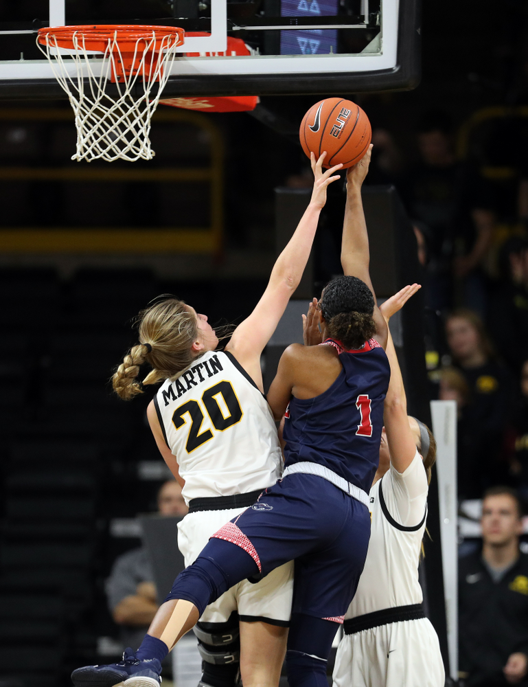 Iowa Hawkeyes guard Kate Martin (20) blocks a shot against Florida Atlantic University Thursday, November 7, 2019 at Carver-Hawkeye Arena. (Brian Ray/hawkeyesports.com)