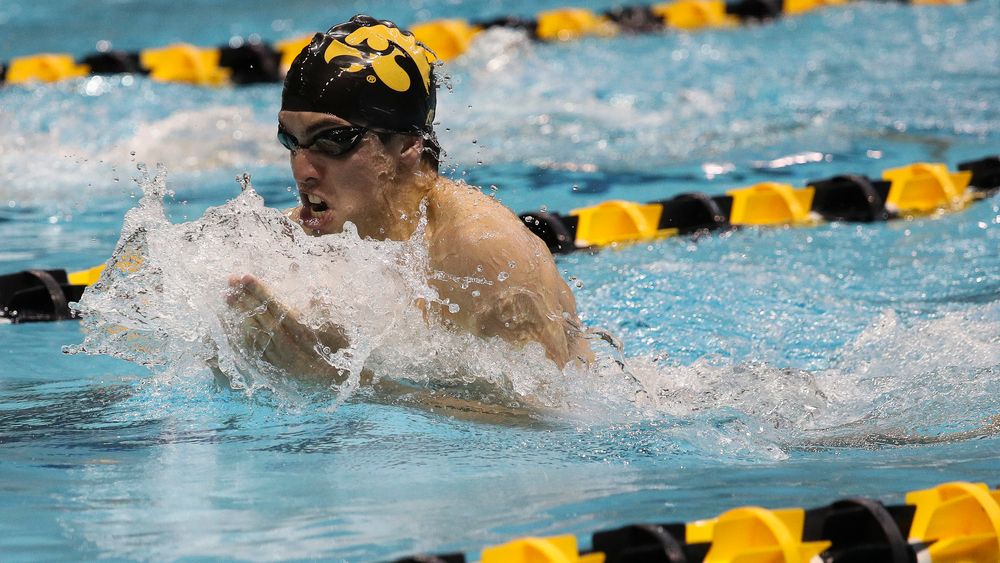 Iowa's Weston Credit competes in the 200-yard breaststroke during a meet against Michigan and Denver at the Campus Recreation and Wellness Center on November 3, 2018. (Tork Mason/hawkeyesports.com)