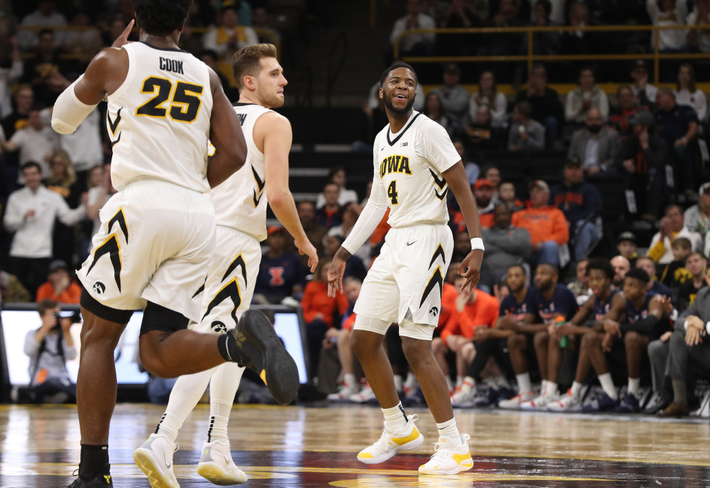 Iowa Hawkeyes guard Isaiah Moss (4) celebrates after making a three point basket against the Illinois Fighting Illini Sunday, January 20, 2019 at Carver-Hawkeye Arena. (Brian Ray/hawkeyesports.com)