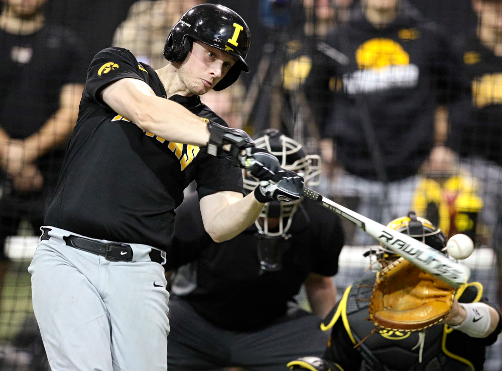 Iowa Hawkeyes pitcher/outfielder Trenton Wallace (38) bats during practice at the Hansen Football Performance Center in Iowa City on Friday, January 24, 2020. (Stephen Mally/hawkeyesports.com)