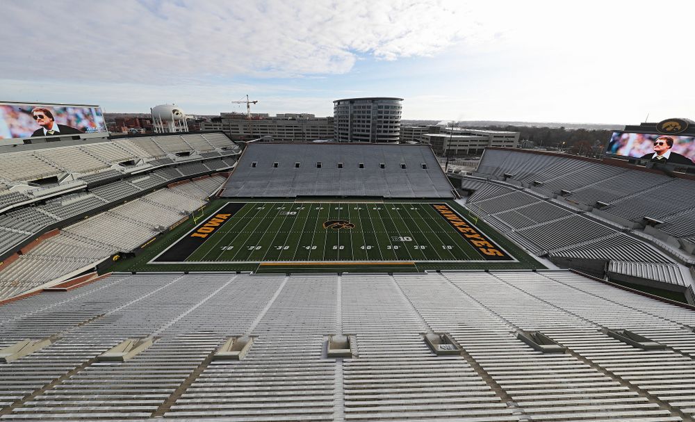 A picture of Hayden Fry is shown on the video boards at Kinnick Stadium in Iowa City on Wednesday, December 18, 2019. Hayden Fry passed away on Dec. 17, at the age of 90. (Stephen Mally/hawkeyesports.com)
