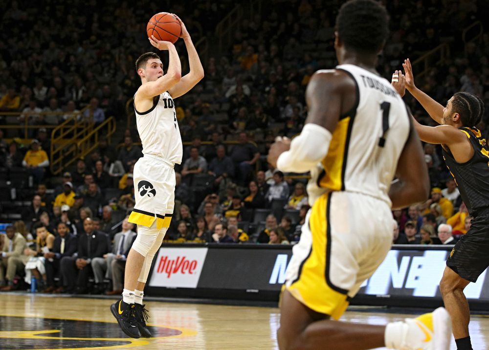 Iowa Hawkeyes guard CJ Fredrick (5) makes a basket during the second half of their their game at Carver-Hawkeye Arena in Iowa City on Sunday, December 29, 2019. (Stephen Mally/hawkeyesports.com)
